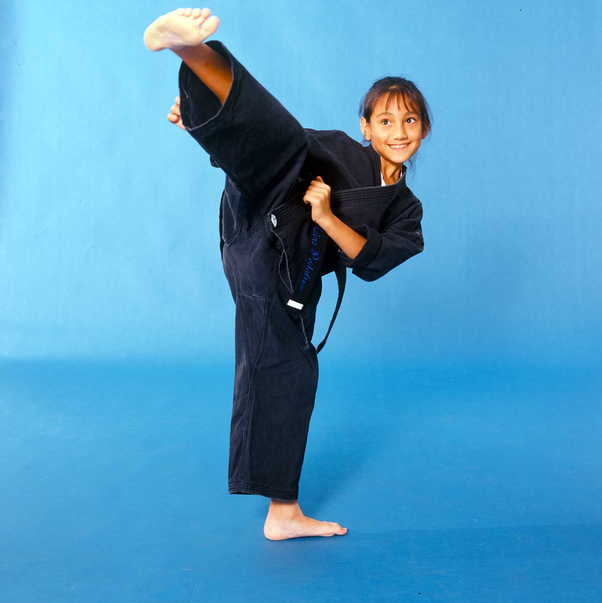 focused girl punching